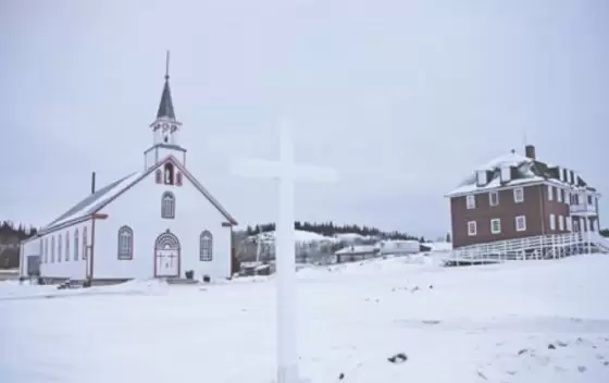 The Nativity of the Blessed Virgin, Roman Catholic Church, Fort Chipewyan. Sadly both the Church and the Father's House on the right were burnt down in an arson attack in 2022.
